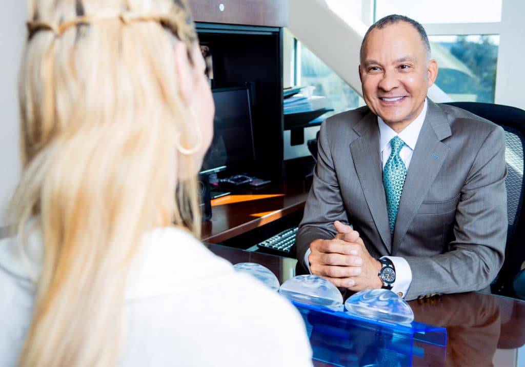 Dr. Delgado discussing the "Yoga Boobs" surgery.