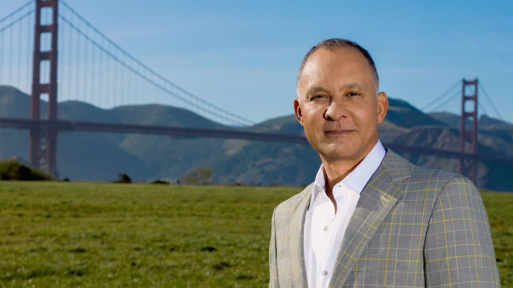 Dr. Miguel Delgado in front of the San Francisco bridge